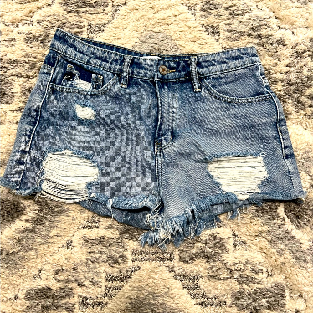 Woman’s distressed denim shorts